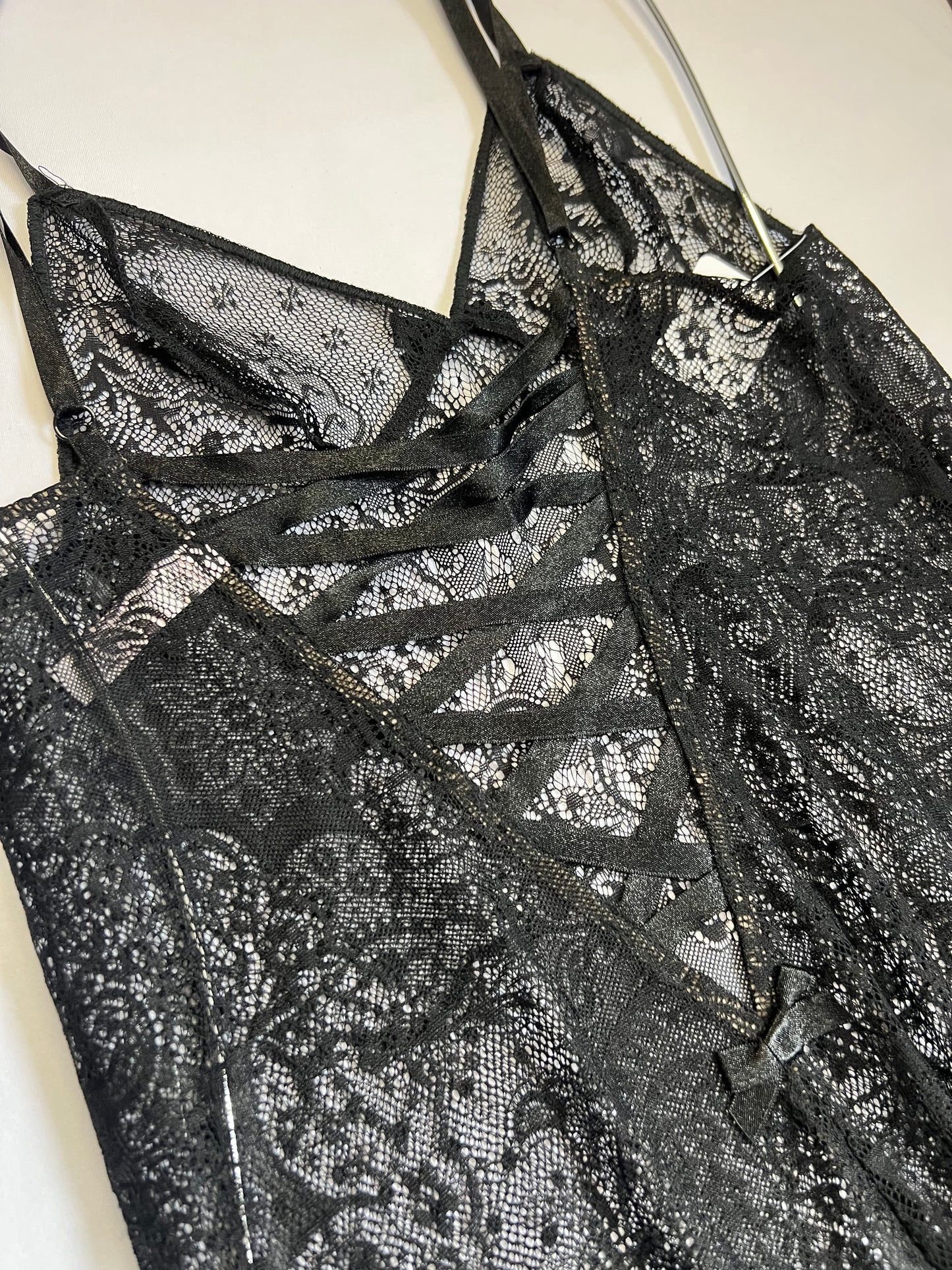 Black Lace Crisscross Bodysuit – Mysterious & Alluring