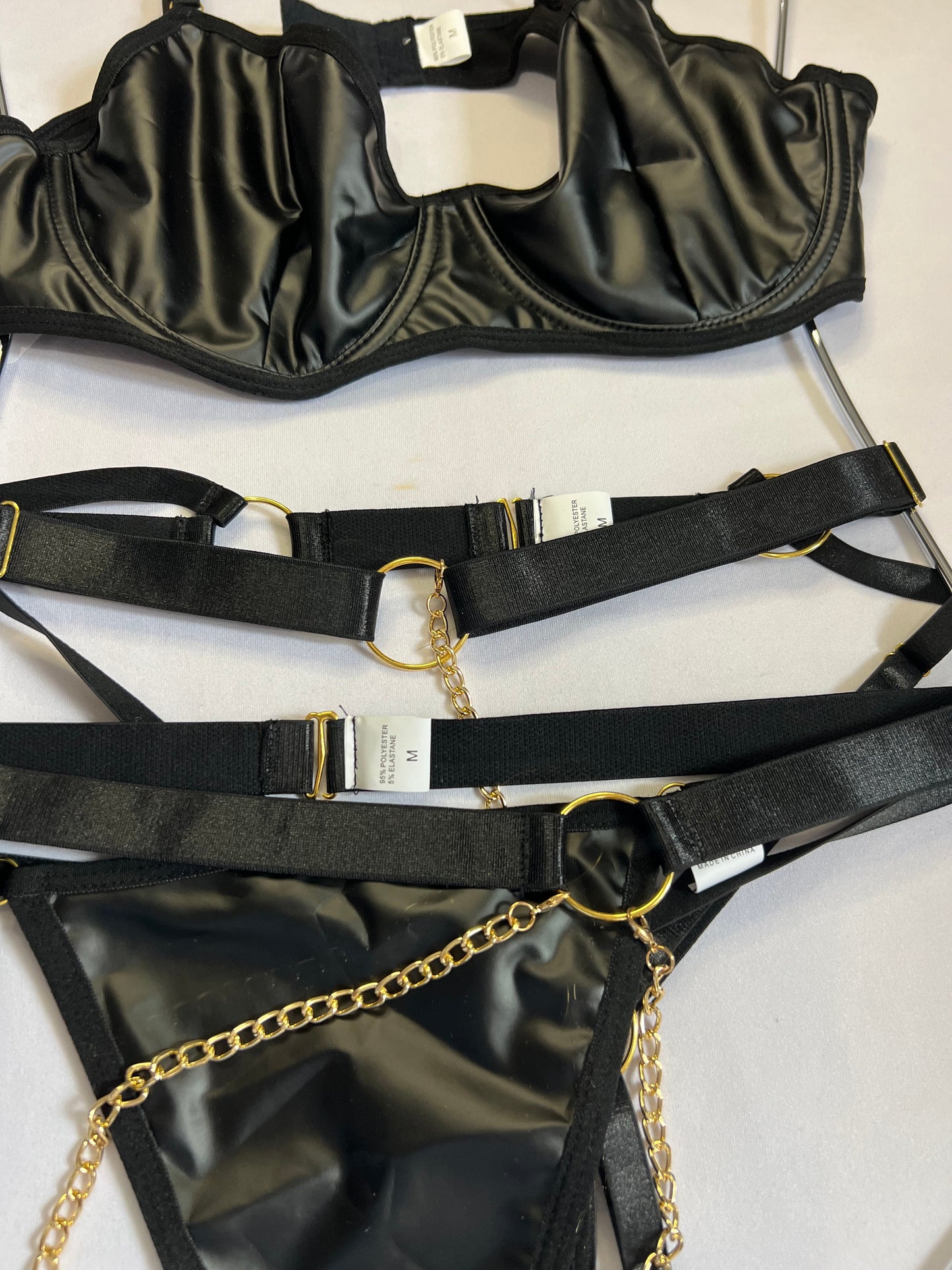 Sultry Black Satin Lingerie Set with Gold Chain Details